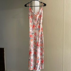 Cowl neck midi dress w/ adjustable straps and slit on left side.